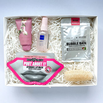 Bathing beauty himalayan salts bath bomb and ted baker gift box A bathing beauty gift box with a couple servings of himalayan bath salts and flowers, Ted baker hand cream and body spray, a candle, matches and a mini bouquet of flowers